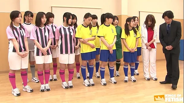 Japanese female team listen and take a lesson from their coach