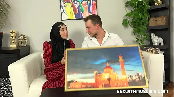 Hot woman in a hijab chose some pictures and some sex