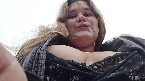 Huge facial of a cute BBW blonde with big breasts in inclement weather