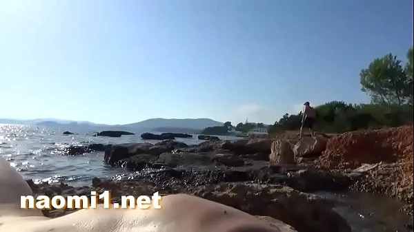 feet playing on a public beach