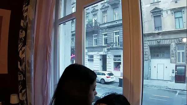 Sex at the window in front of strangers